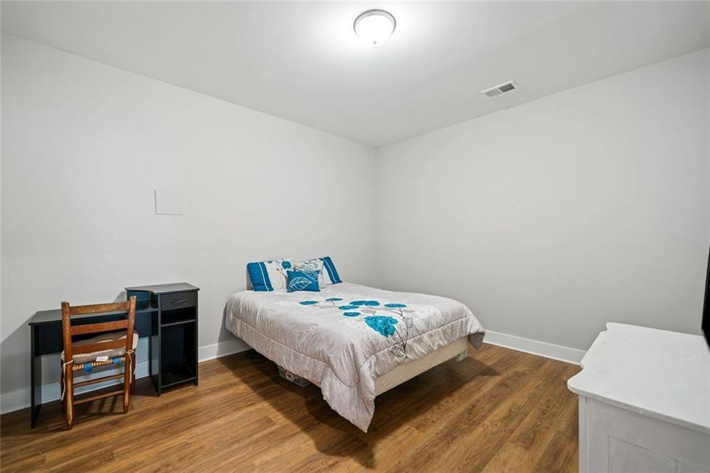 2 Village Ridge Jasper, GA 30143 - Photo 41 of 45 a bedroom with a bed and a bookshelf