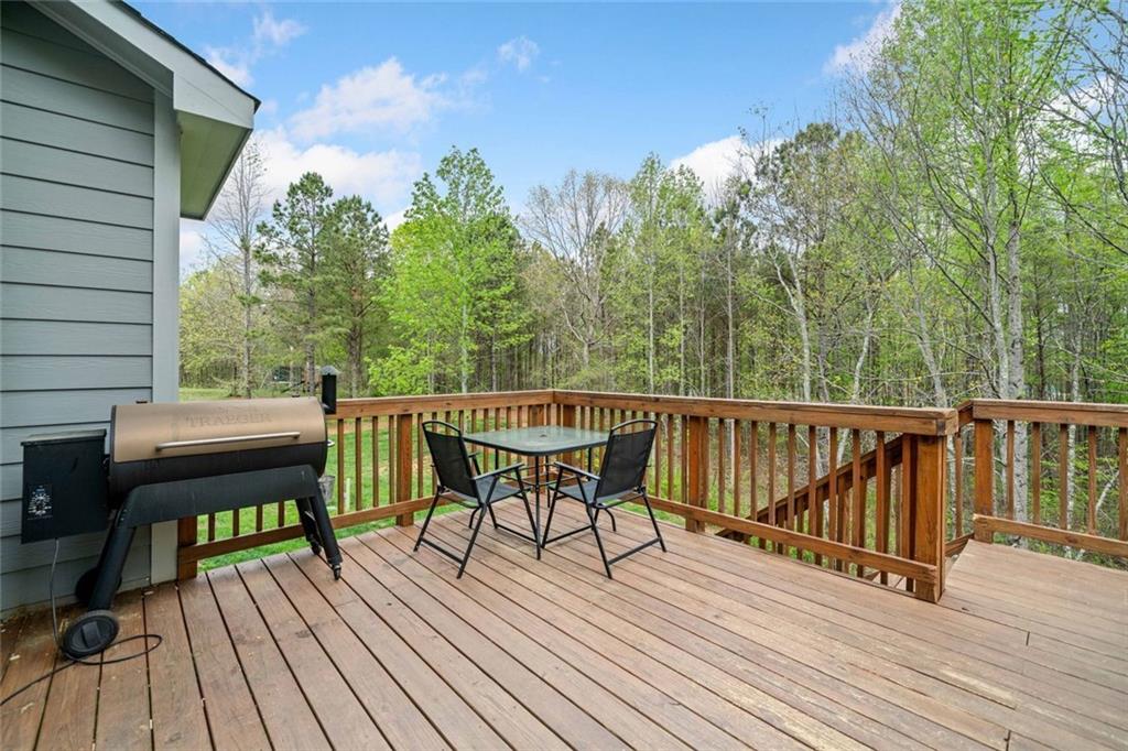 2 Village Ridge Jasper, GA 30143 - Photo 44 of 45 a view of a deck with wooden floor and outdoor seating