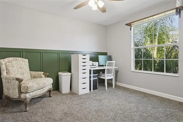 a view of room with baby crib