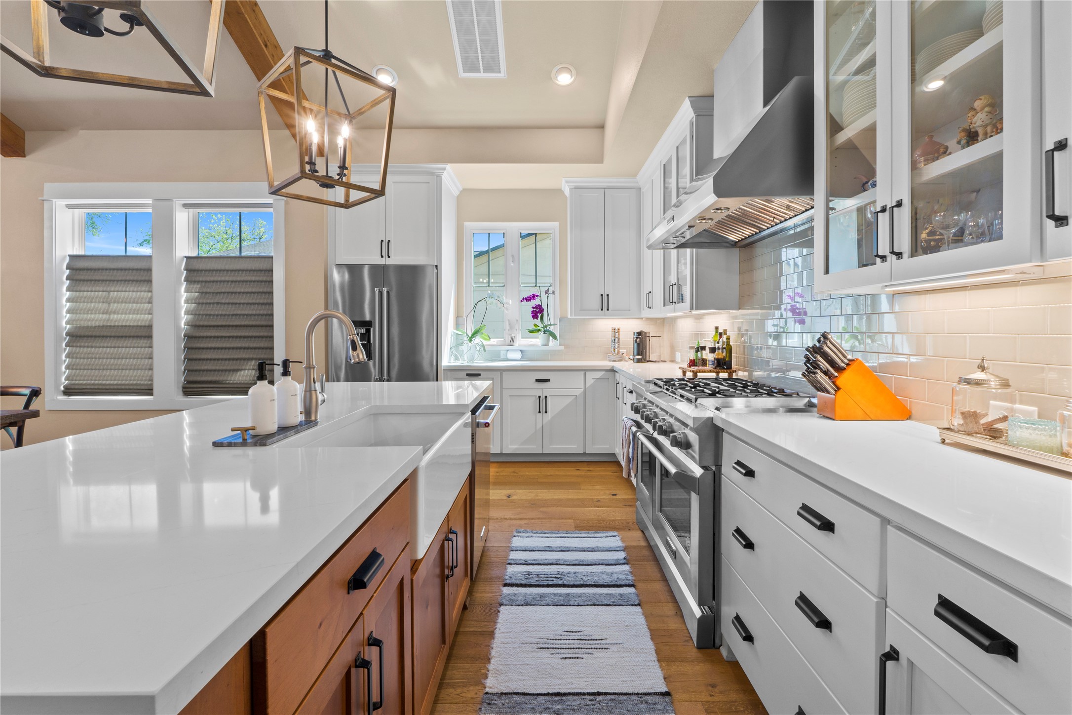2004 Alegria Road Austin, TX 78757 - Photo 11 of 40 a kitchen with stainless steel appliances granite countertop a sink and stove