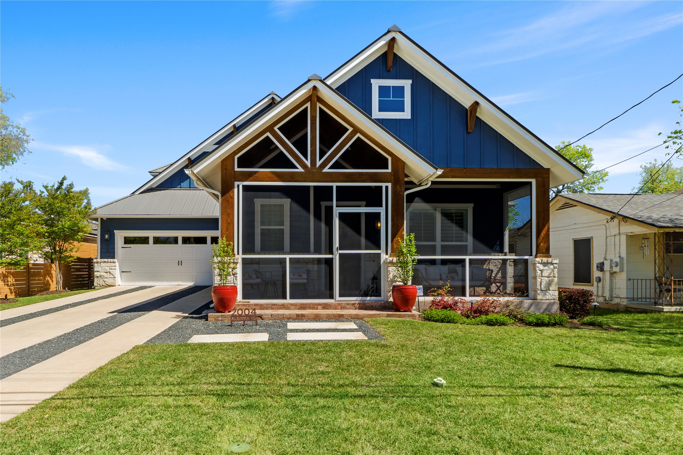 2004 Alegria Road Austin, TX 78757 - Photo 2 of 40 a front view of a house with a yard