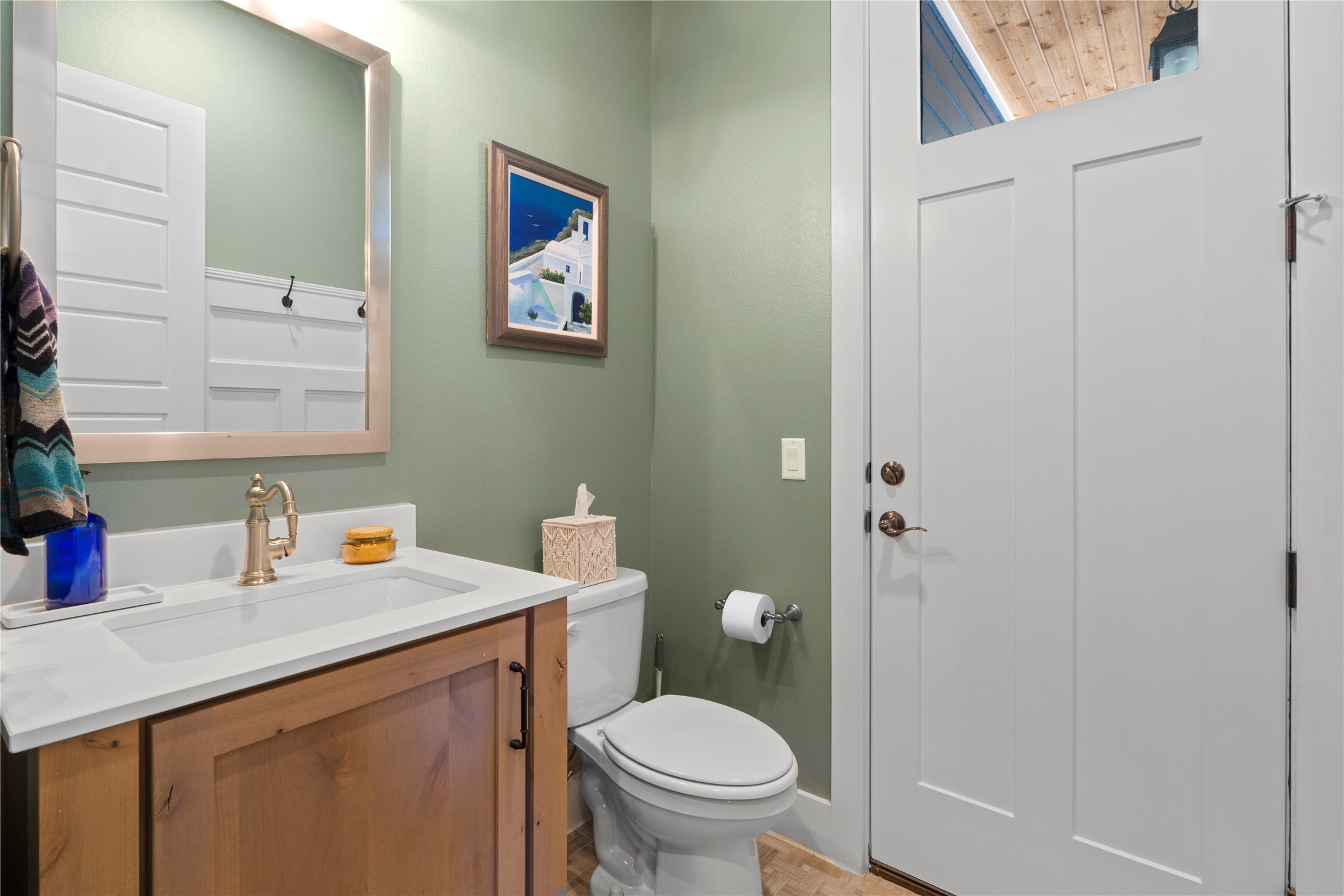 2004 Alegria Road Austin, TX 78757 - Photo 30 of 40 a bathroom with a toilet sink and mirror