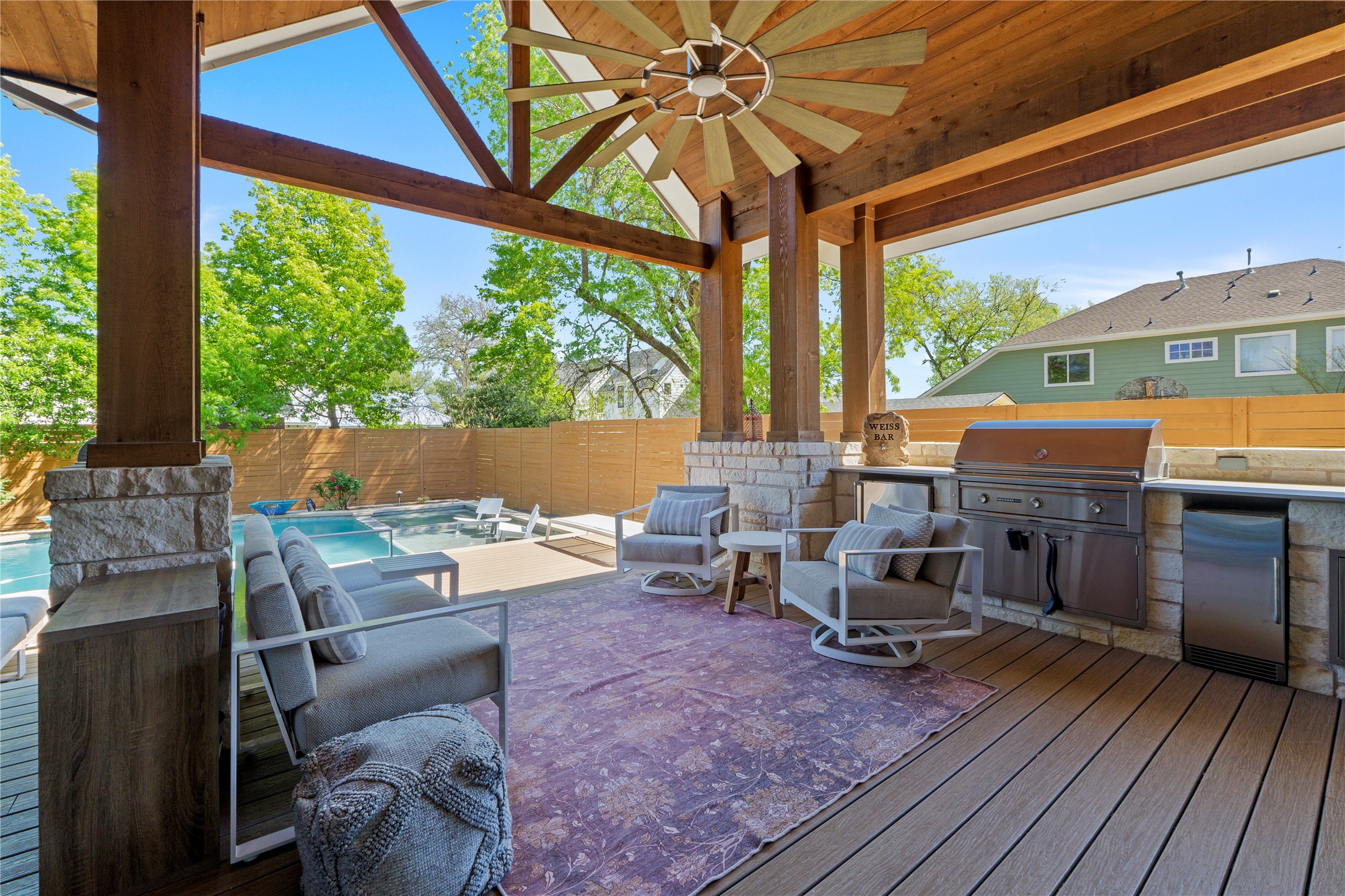 2004 Alegria Road Austin, TX 78757 - Photo 34 of 40 a living room with a couch and large windows