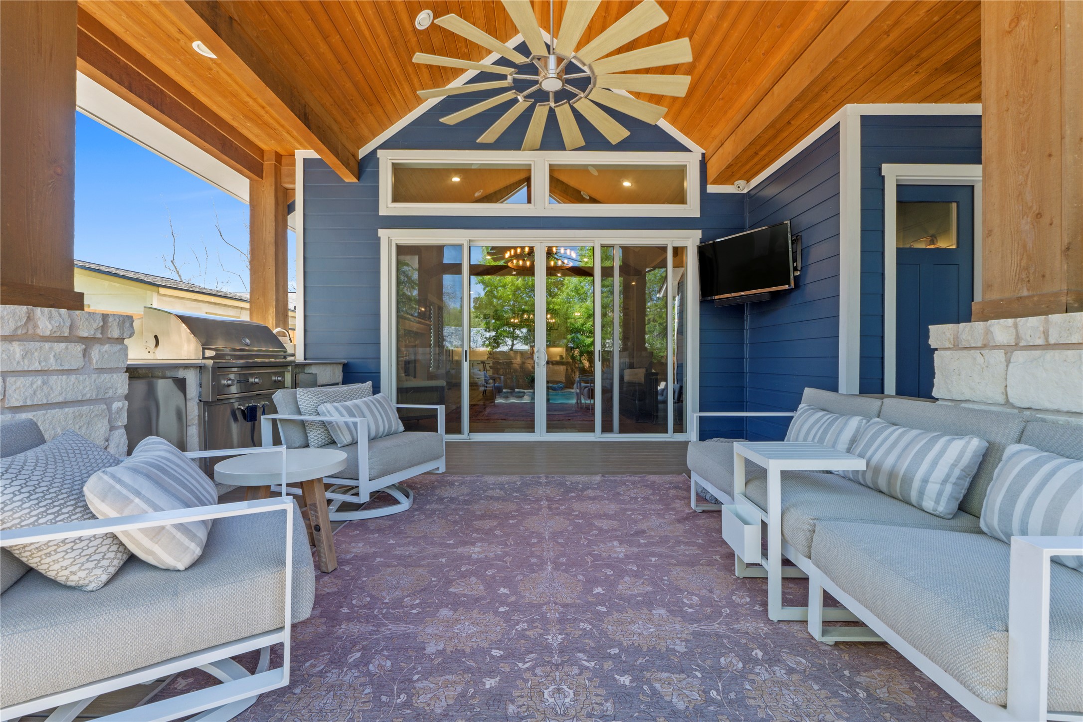 2004 Alegria Road Austin, TX 78757 - Photo 35 of 40 a living room with furniture and a floor to ceiling window