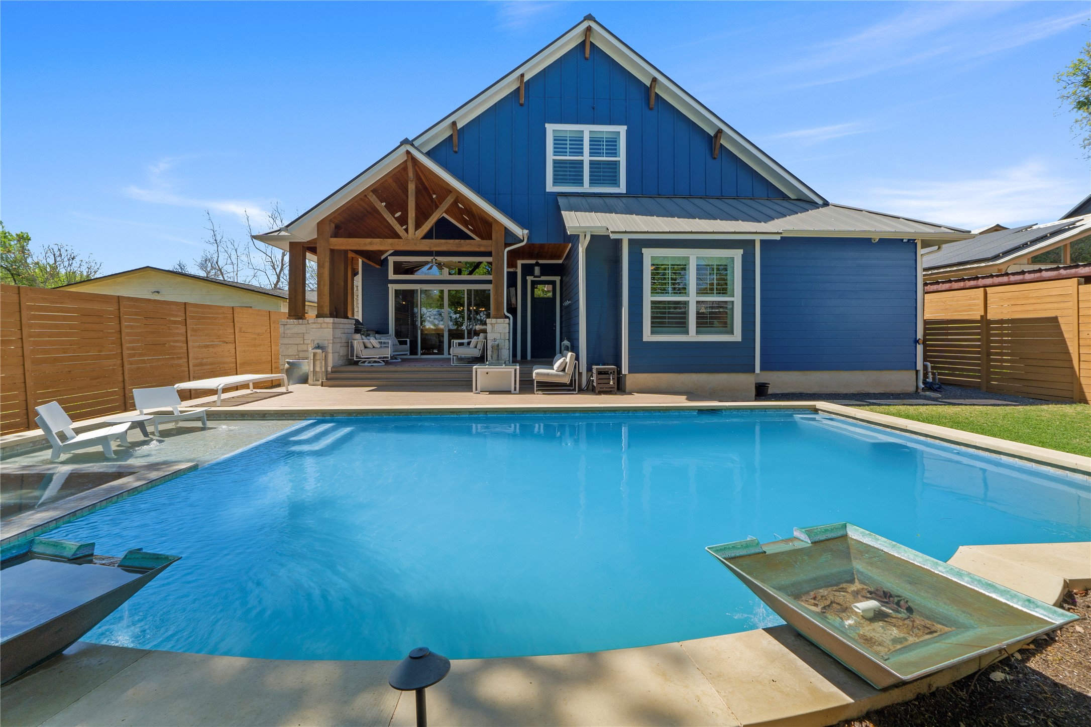 2004 Alegria Road Austin, TX 78757 - Photo 39 of 40 a front view of a house with yard and seating area