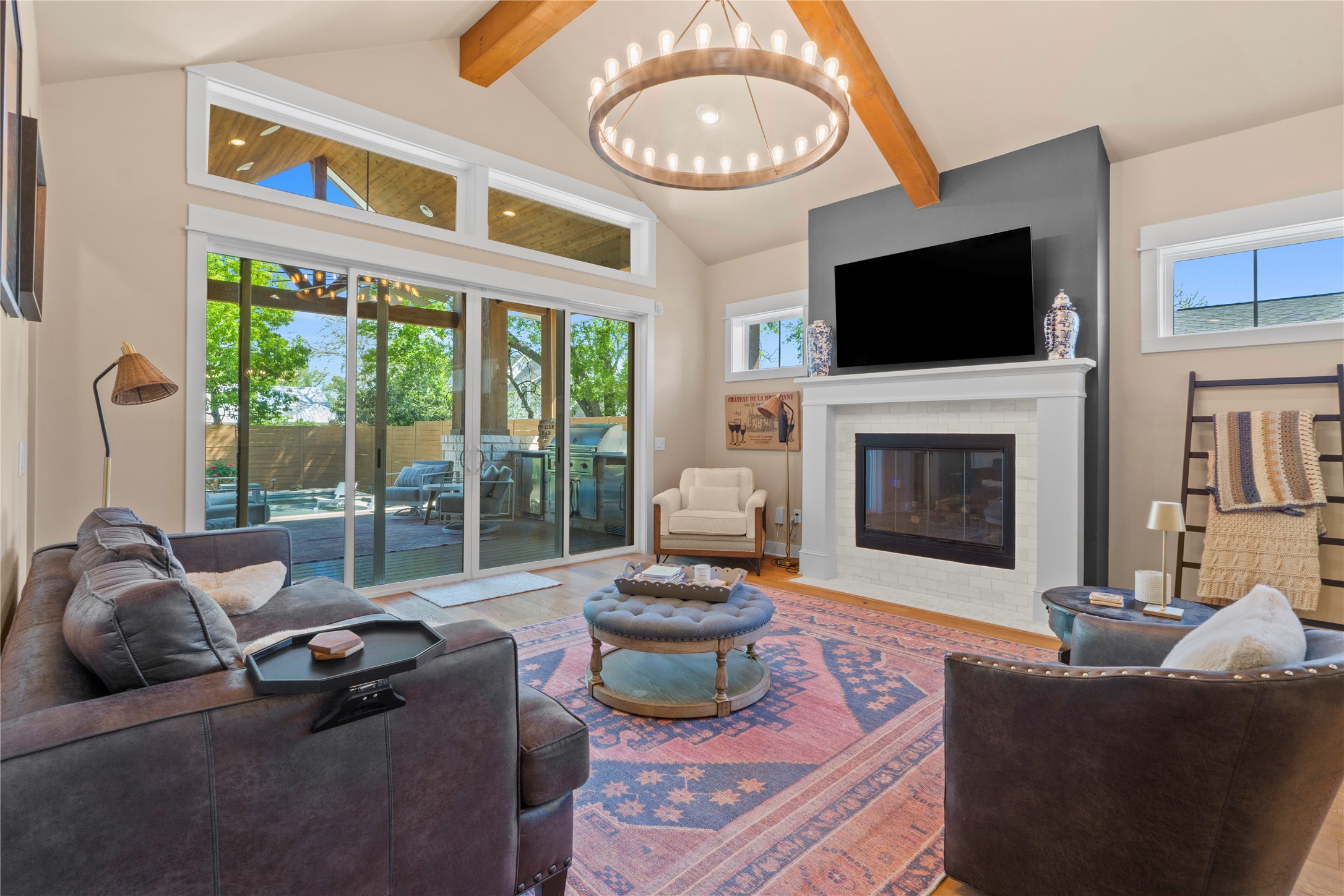 2004 Alegria Road Austin, TX 78757 - Photo 7 of 40 a living room with fireplace furniture and a flat screen tv