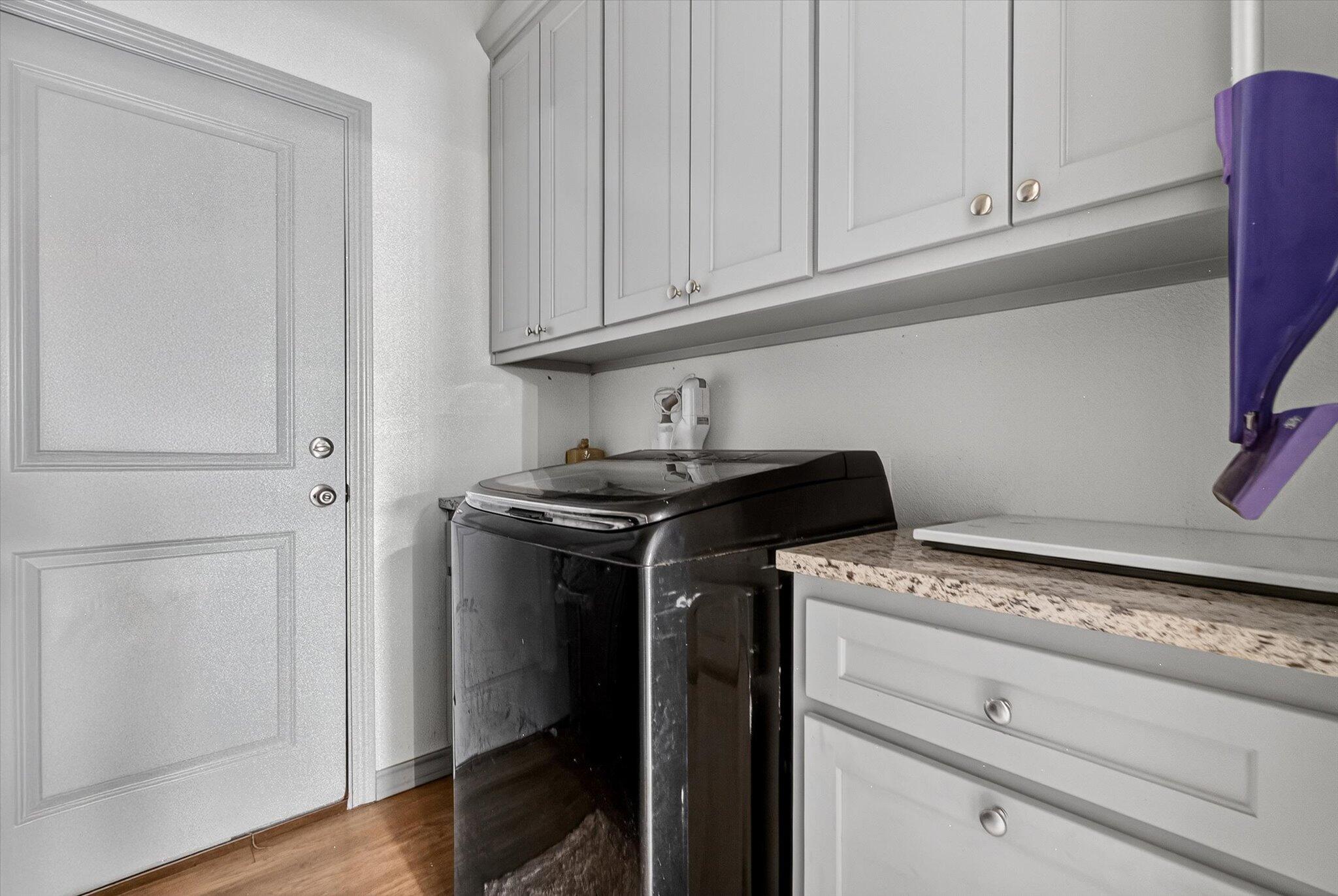 187 Allison Road Wilson, TX 79381 - Photo 16 of 35 a utility room with dryer and washer