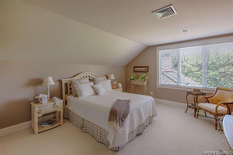 56 The Heights Mashpee, MA 02649 - Photo 11 of 16 a bedroom with a bed and a couch