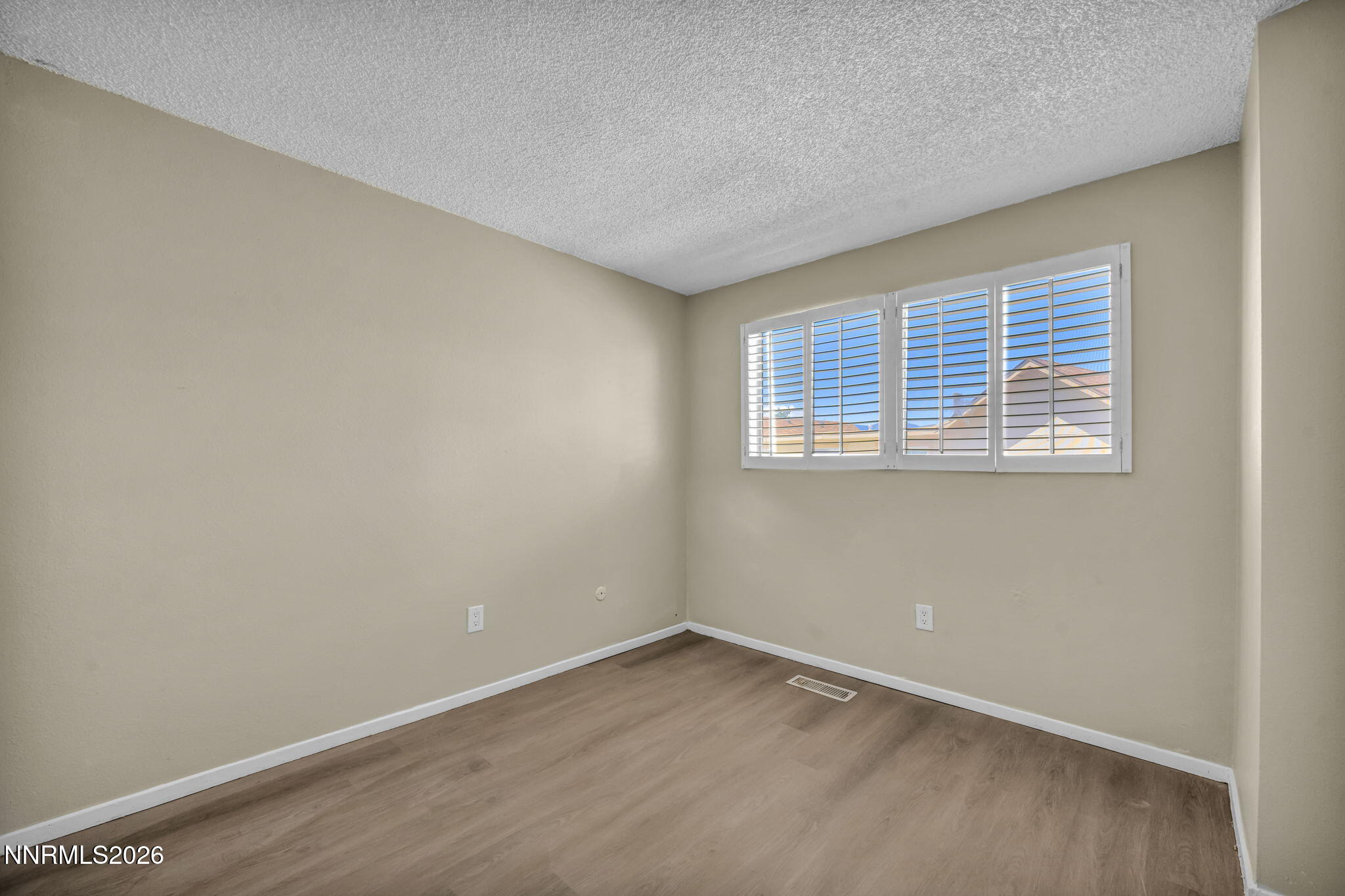 19 Condor Circle Carson City, NV 89701 - Photo 30 of 41 an empty room with a window