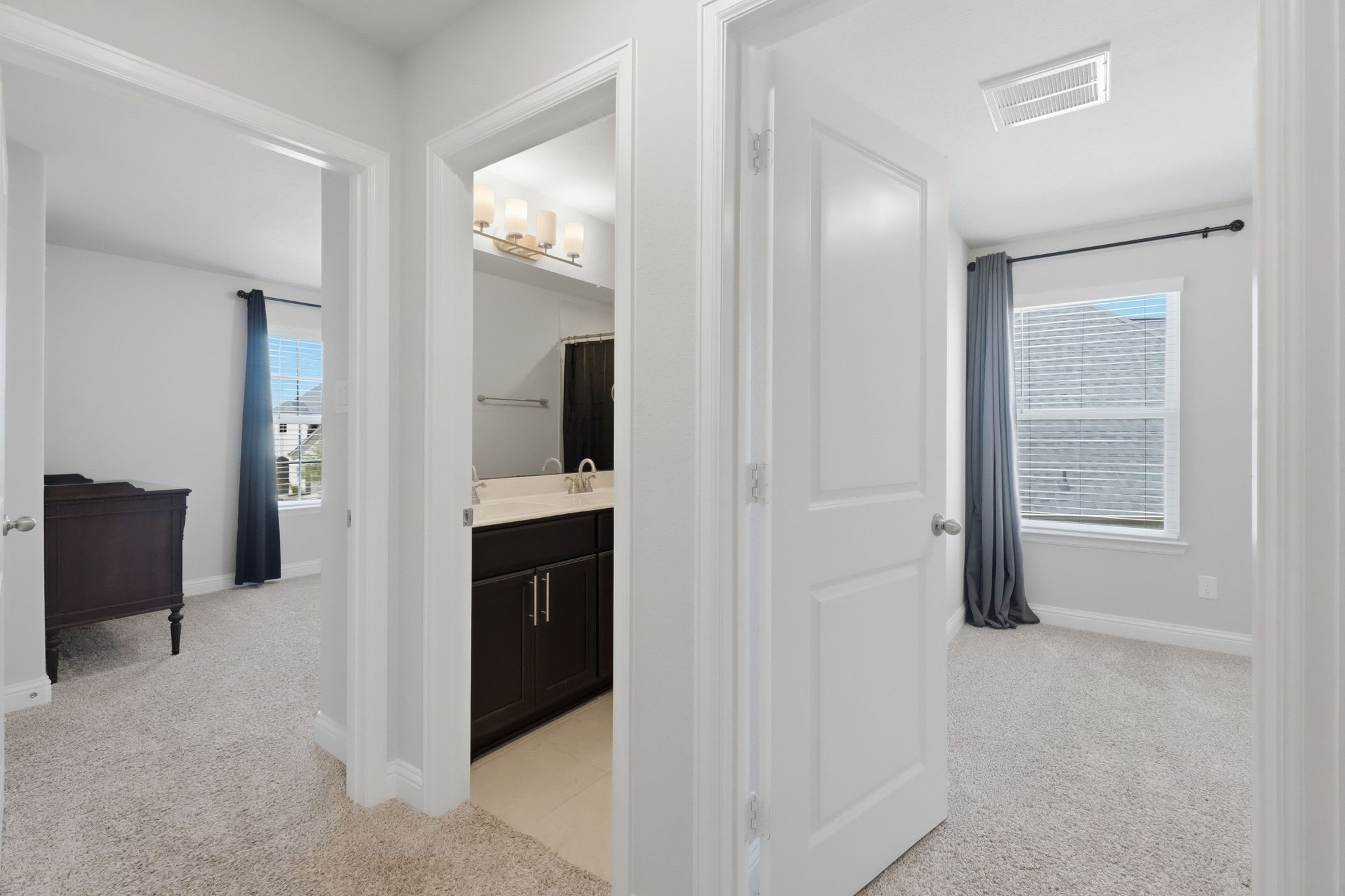 2809 Andante Green Drive Spring, TX 77386 - Photo 31 of 50 a view of a hallway with closet and bathroom