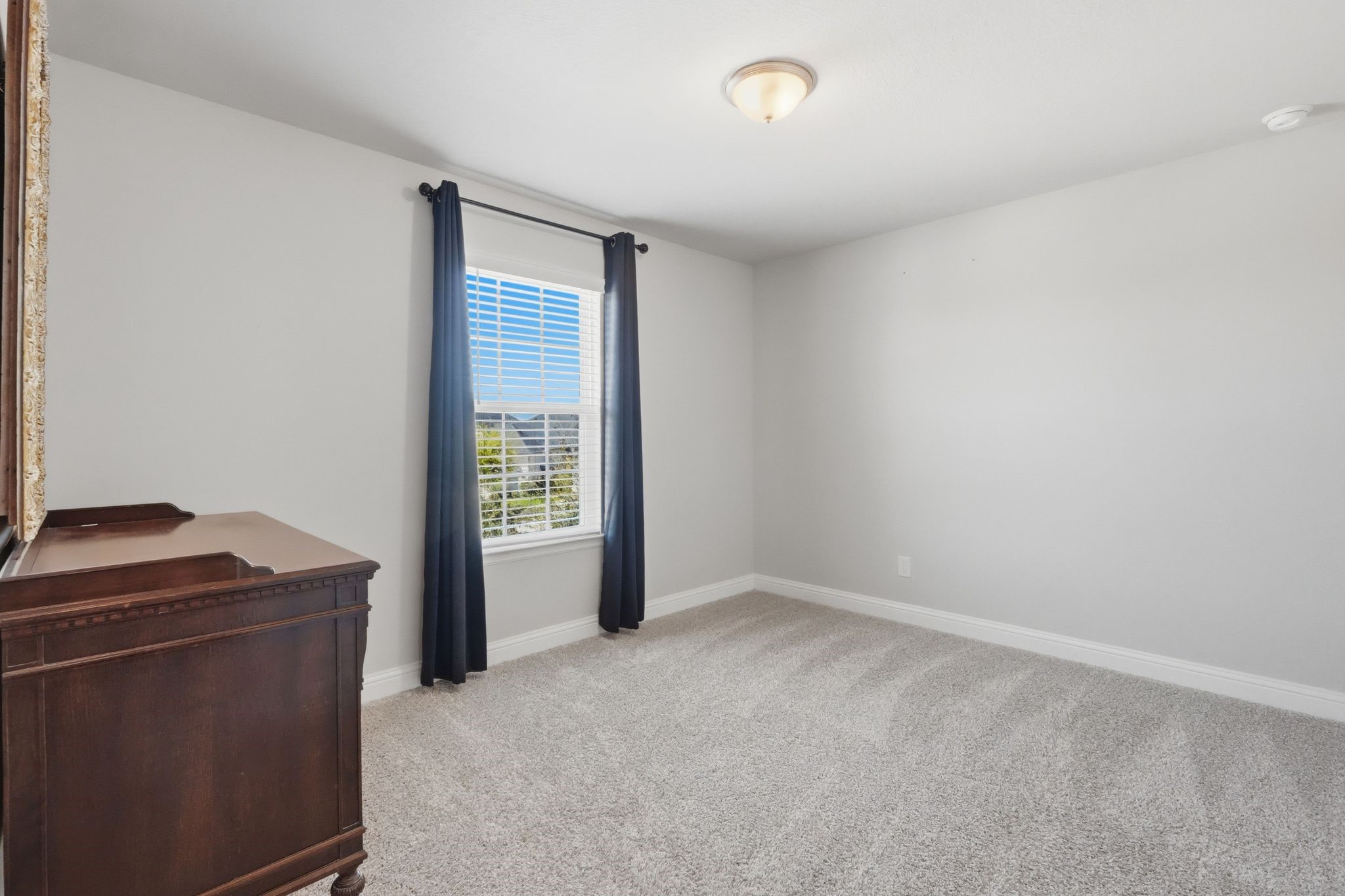 2809 Andante Green Drive Spring, TX 77386 - Photo 35 of 50 a view of an empty room with a window