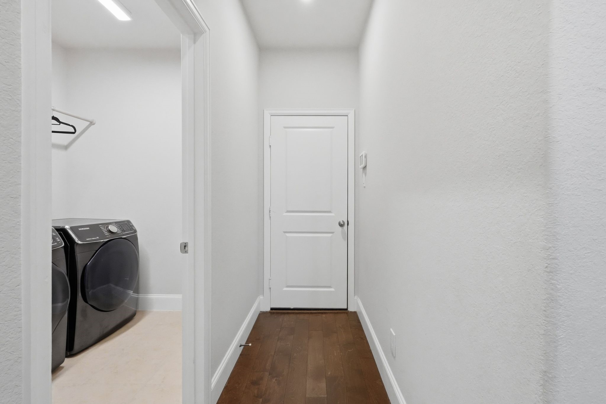 2809 Andante Green Drive Spring, TX 77386 - Photo 39 of 50 a view of a hallway with wooden floor and closet