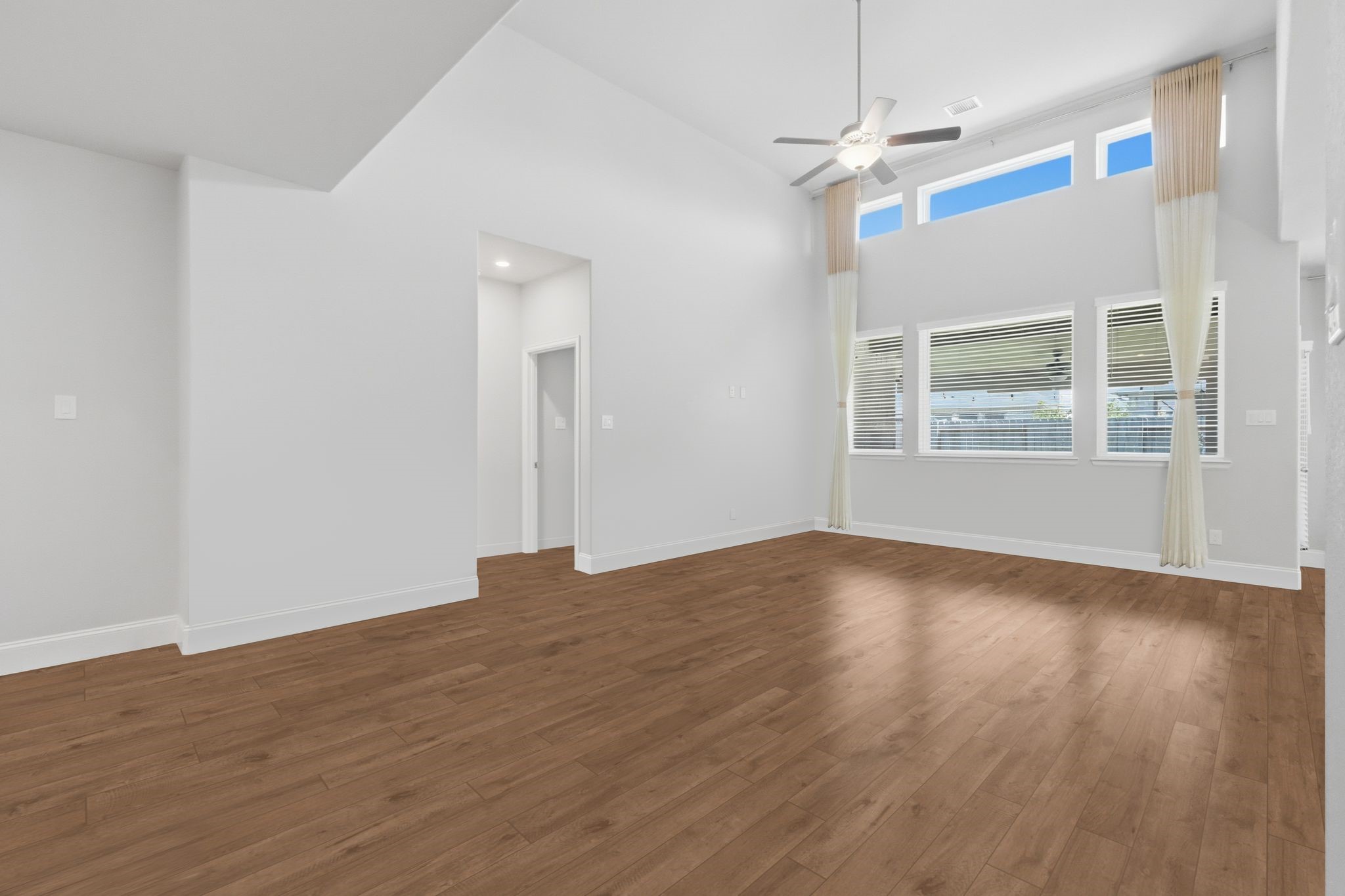 2809 Andante Green Drive Spring, TX 77386 - Photo 6 of 50 wooden floor in an empty room with a window