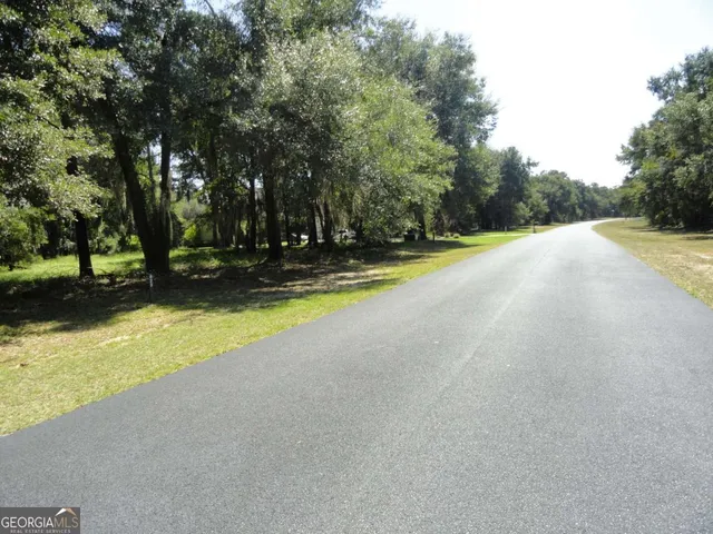 a view of a swimming pool with an outdoor space and seating area