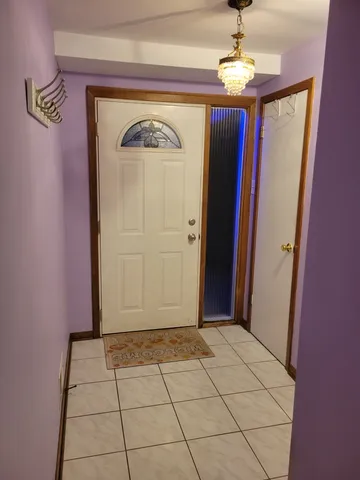 a living room with furniture and a gate