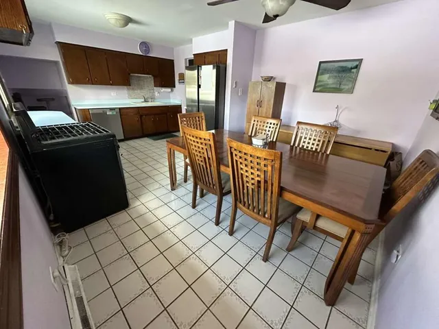 a kitchen with a sink a counter top space and appliances