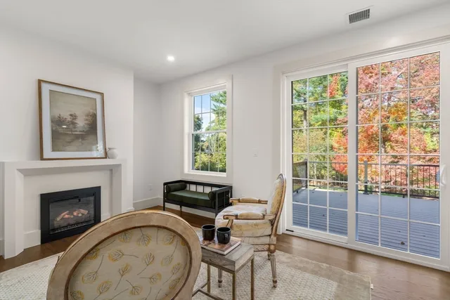 a bathroom with a shower sink vanity and mirror
