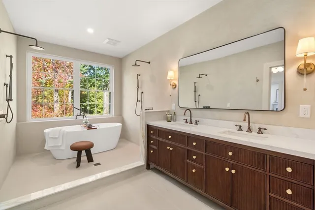 a living room with furniture and a rug