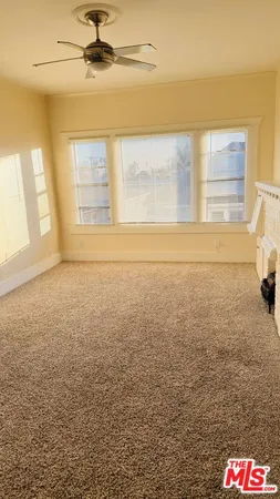 a view of a room with an empty space