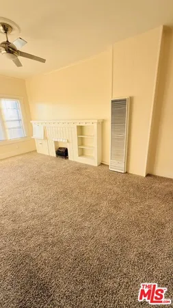 a stove top oven sitting inside of a kitchen