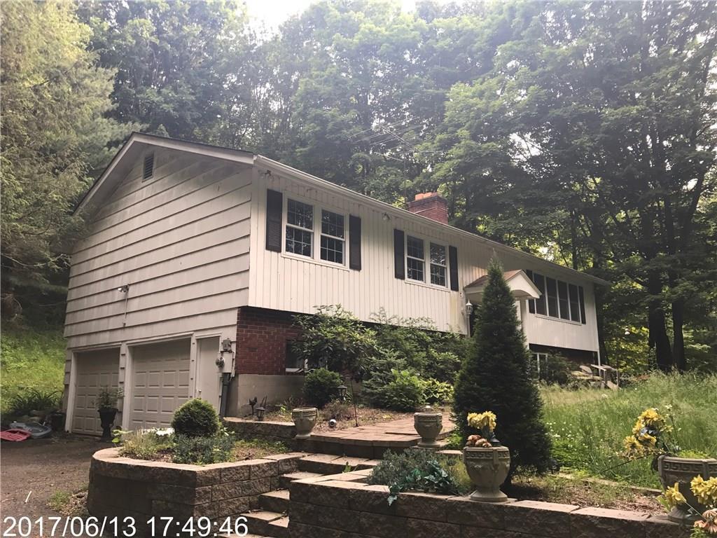 150 Turkey Roost Road Monroe, CT 06468 - Photo 1 of 1 a front view of a house with garden