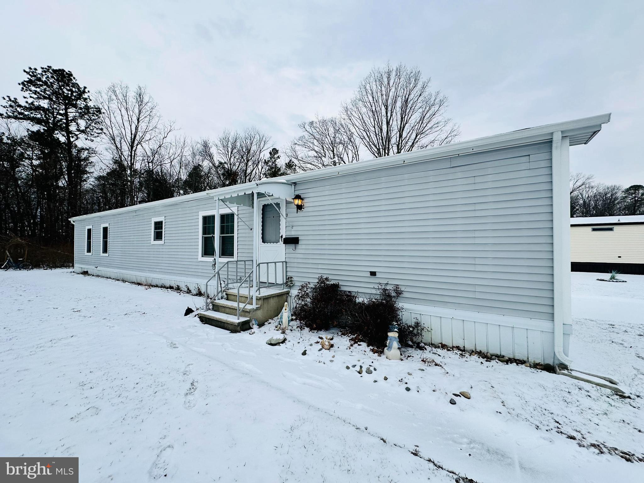 269 Mayflower Drive Buena, NJ 08310 - Photo 1 of 50 a front view of a house with a yard