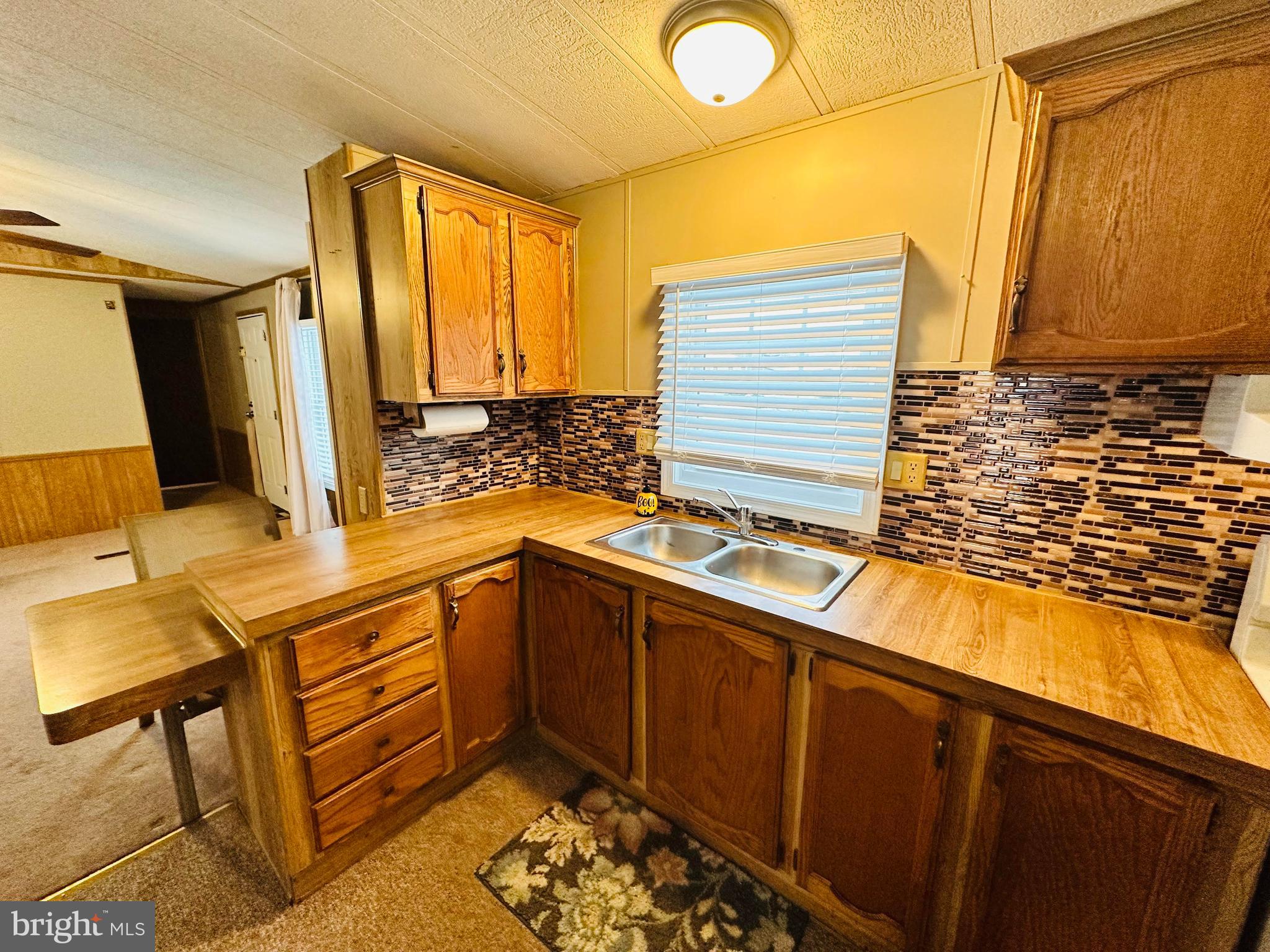 269 Mayflower Drive Buena, NJ 08310 - Photo 14 of 50 a kitchen with a sink and a window