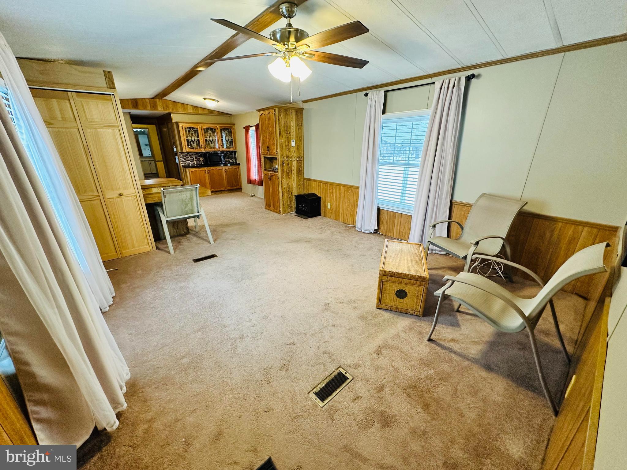 269 Mayflower Drive Buena, NJ 08310 - Photo 32 of 50 a living room with furniture and a flat screen tv