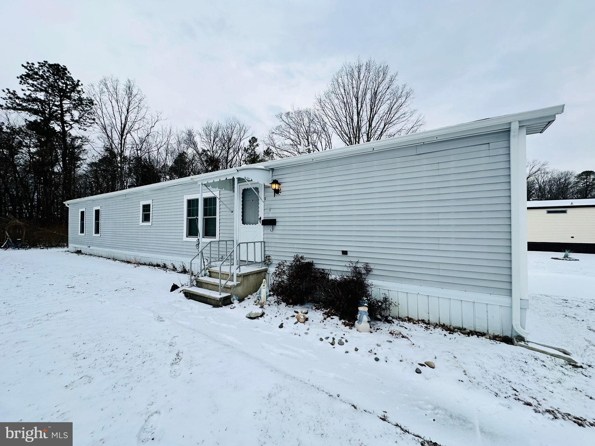 269 Mayflower Drive Buena, NJ 08310 - Photo 9 of 50 a front view of a house with a yard