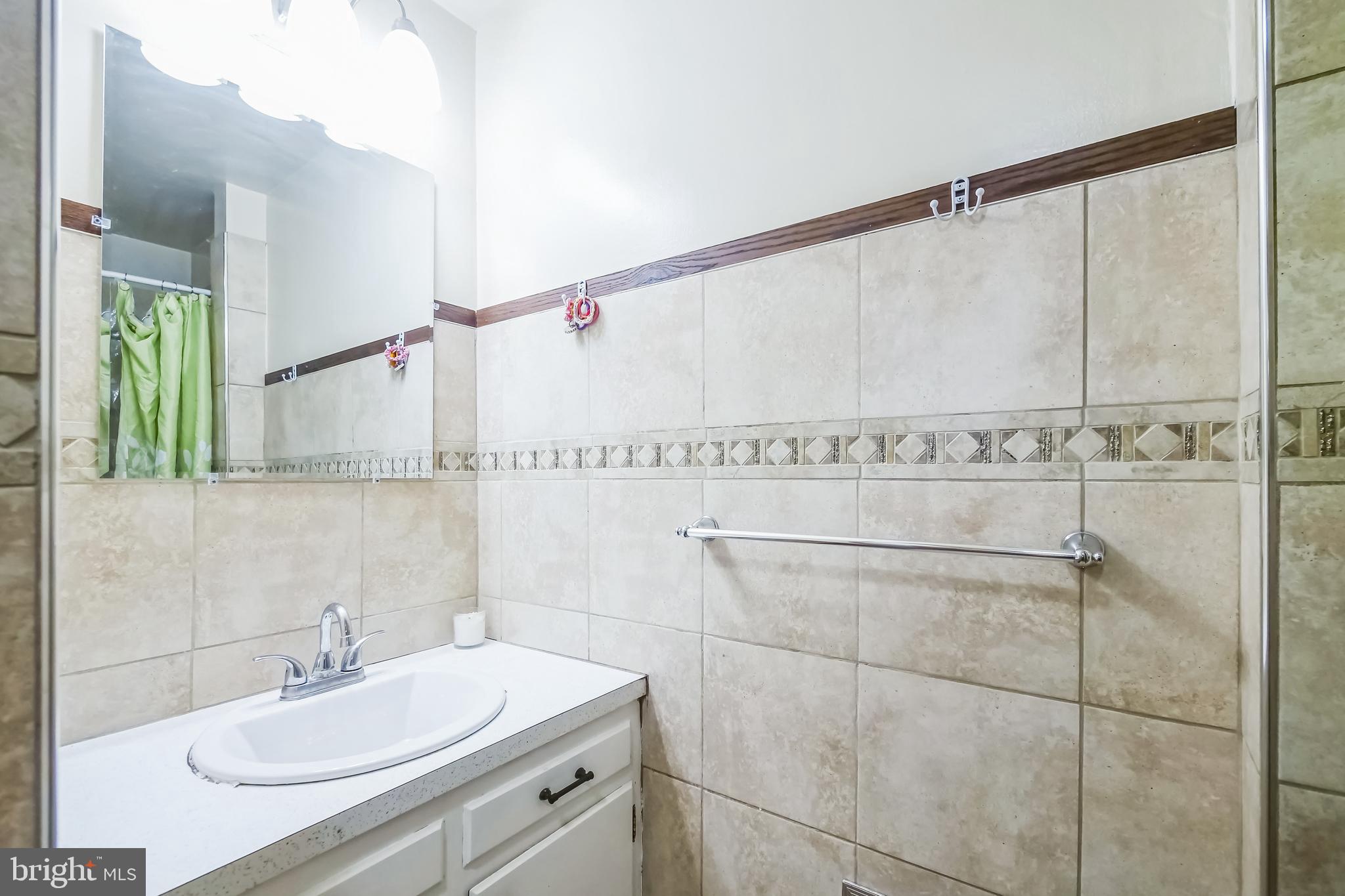 323 Russelcroft Road Winchester, VA 22601 - Photo 9 of 40 a bathroom with a sink and a mirror