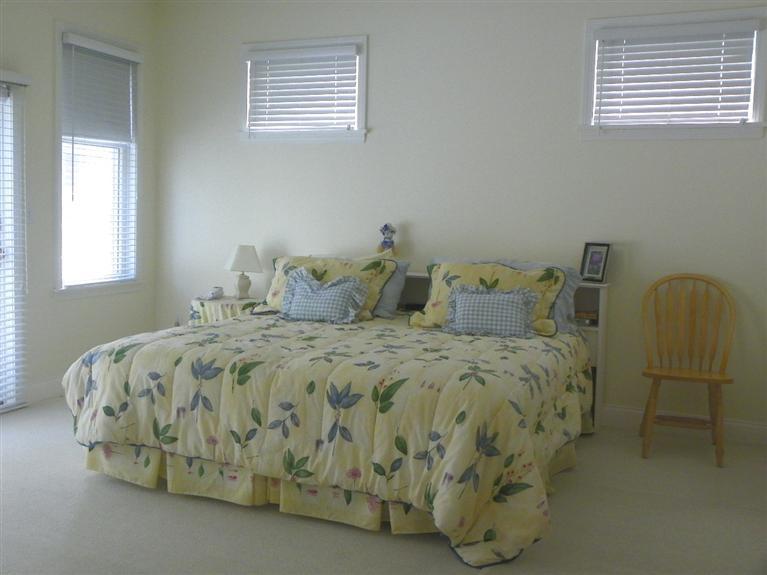 8 Finway Mashpee, MA 02649 - Photo 12 of 35 a bedroom with a bed and window