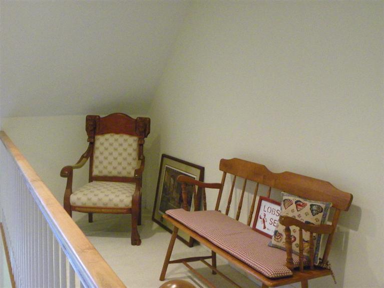 8 Finway Mashpee, MA 02649 - Photo 18 of 35 a living room with furniture and a wooden floor