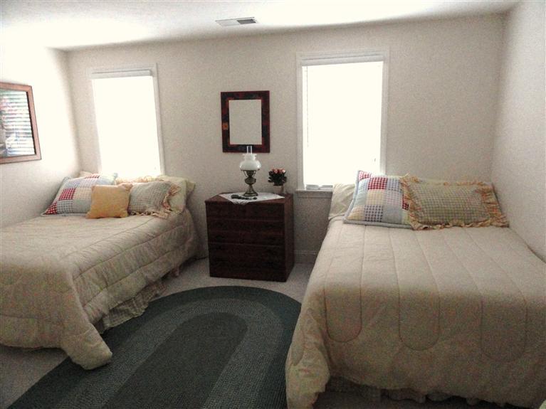 8 Finway Mashpee, MA 02649 - Photo 23 of 35 a bedroom with a bed and window