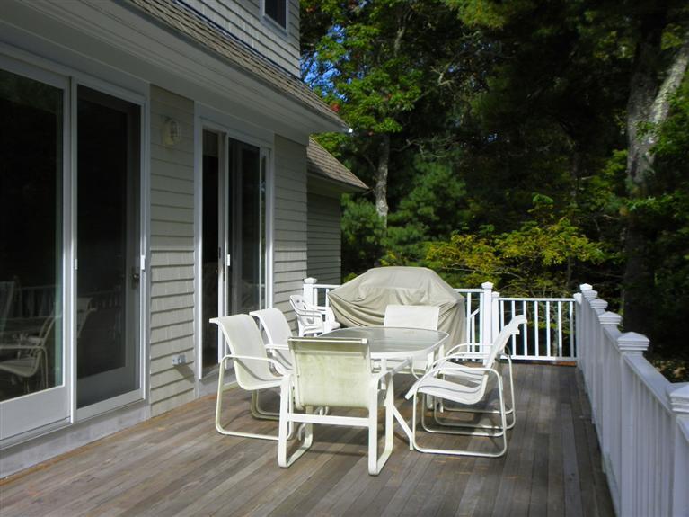 8 Finway Mashpee, MA 02649 - Photo 29 of 35 a view of a table and chairs in patio of the house