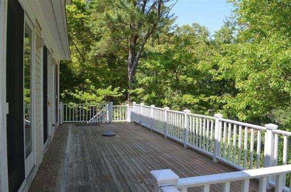 8 Finway Mashpee, MA 02649 - Photo 31 of 35 a view of a balcony with wooden floor