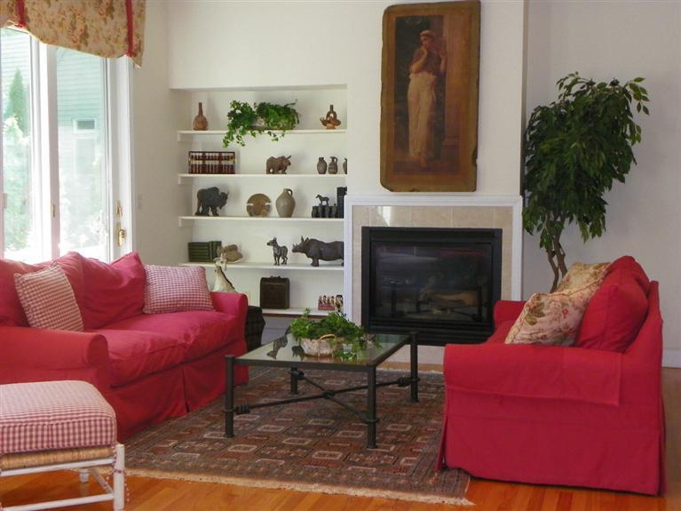 8 Finway Mashpee, MA 02649 - Photo 10 of 35 a living room with furniture fireplace and potted plant