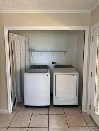 a utility room with a washer and dryer