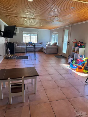 a room with furniture and a window