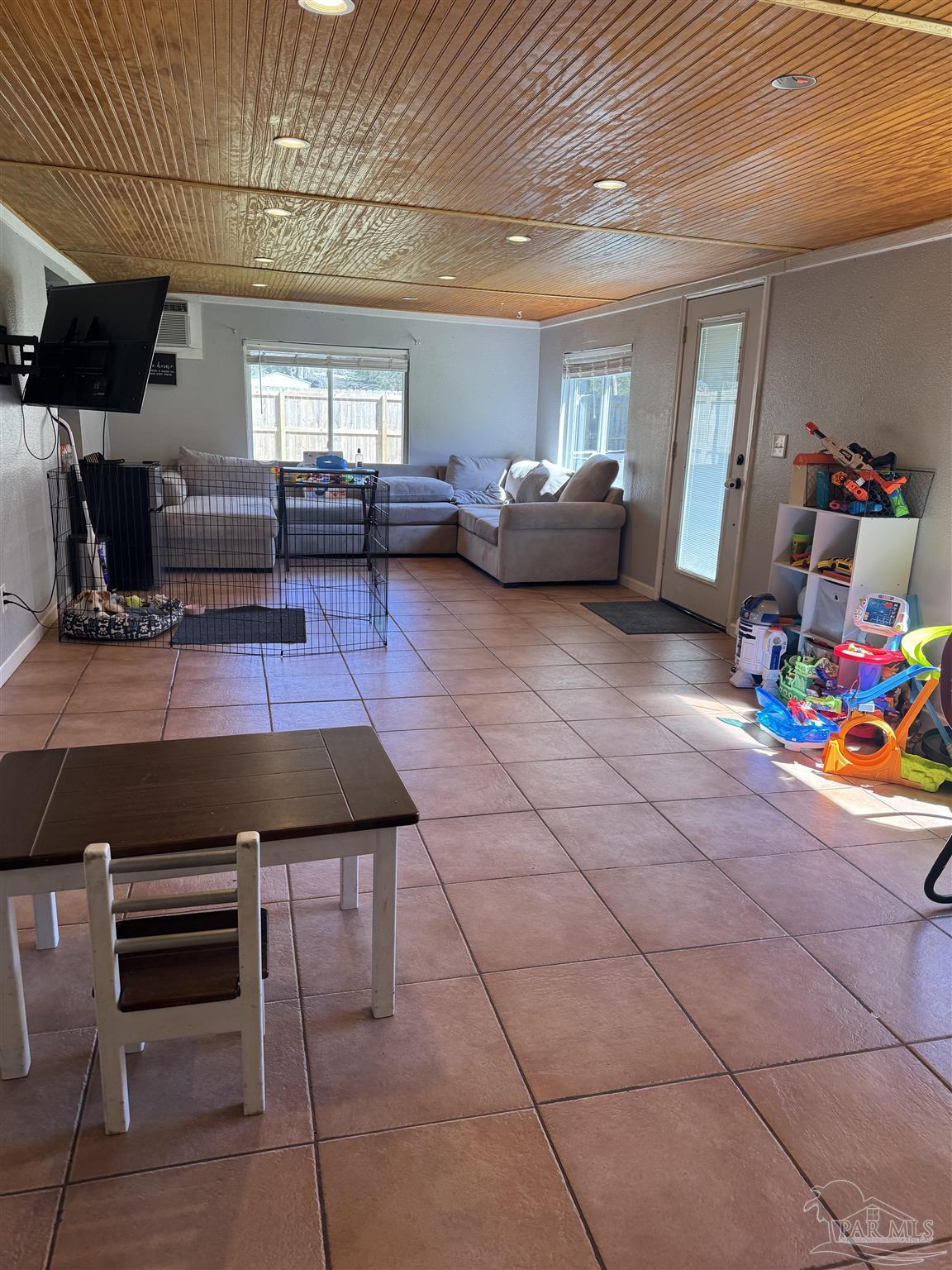 4400 Mundy Lane Pace, FL 32571 - Photo 8 of 23 a room with furniture and a window