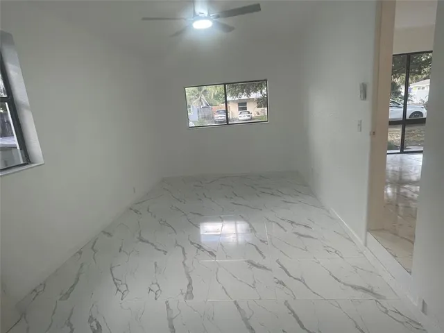 an empty room with windows