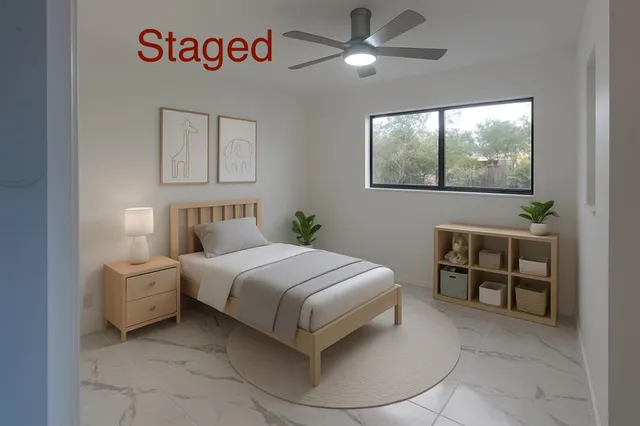 a bedroom with a bed and a window