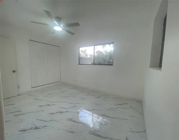 an empty room with windows