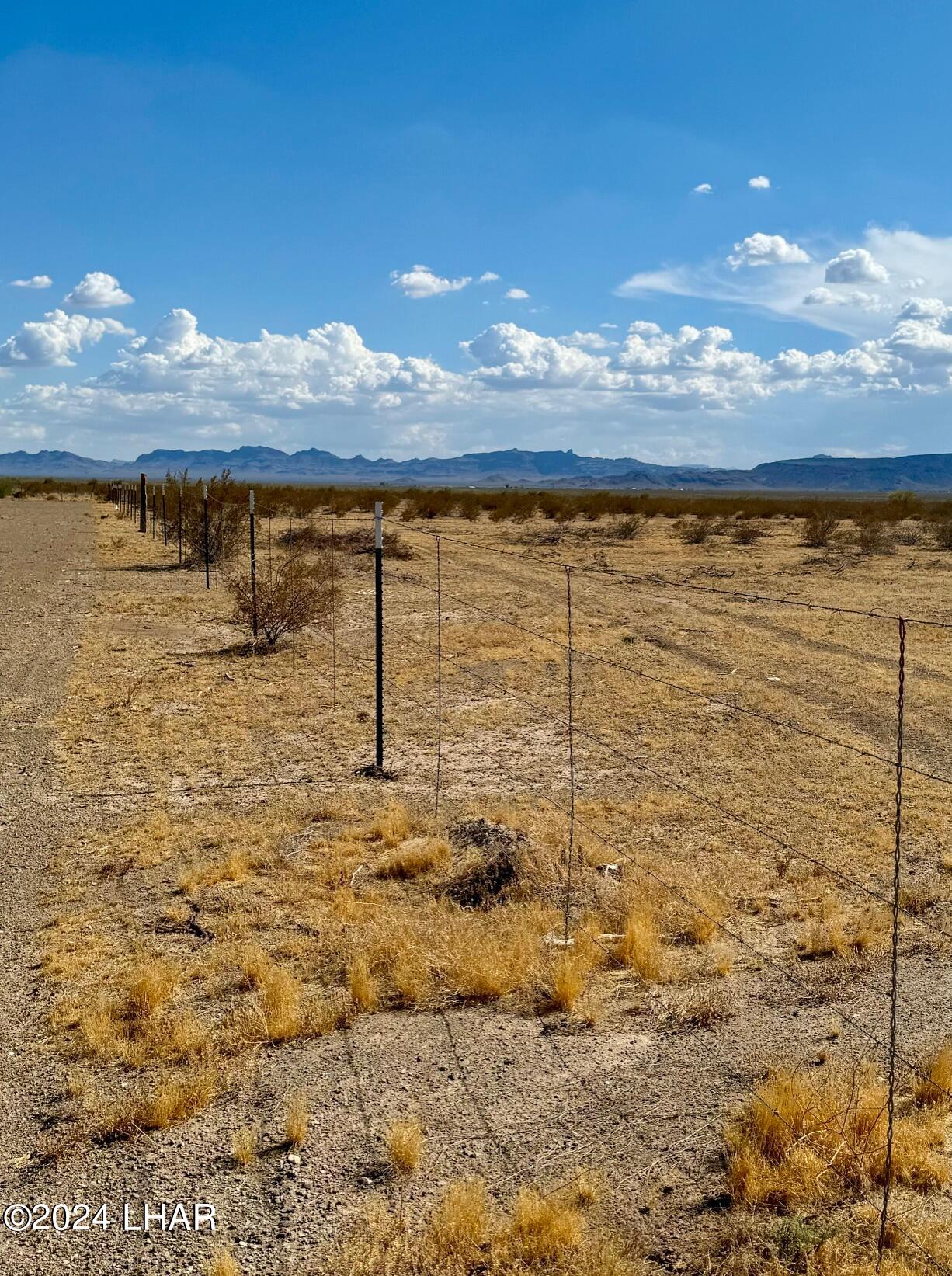 39880 McVay Road Salome, AZ 85348 - Photo 7 of 27 4 Strands of Barbed Wire.