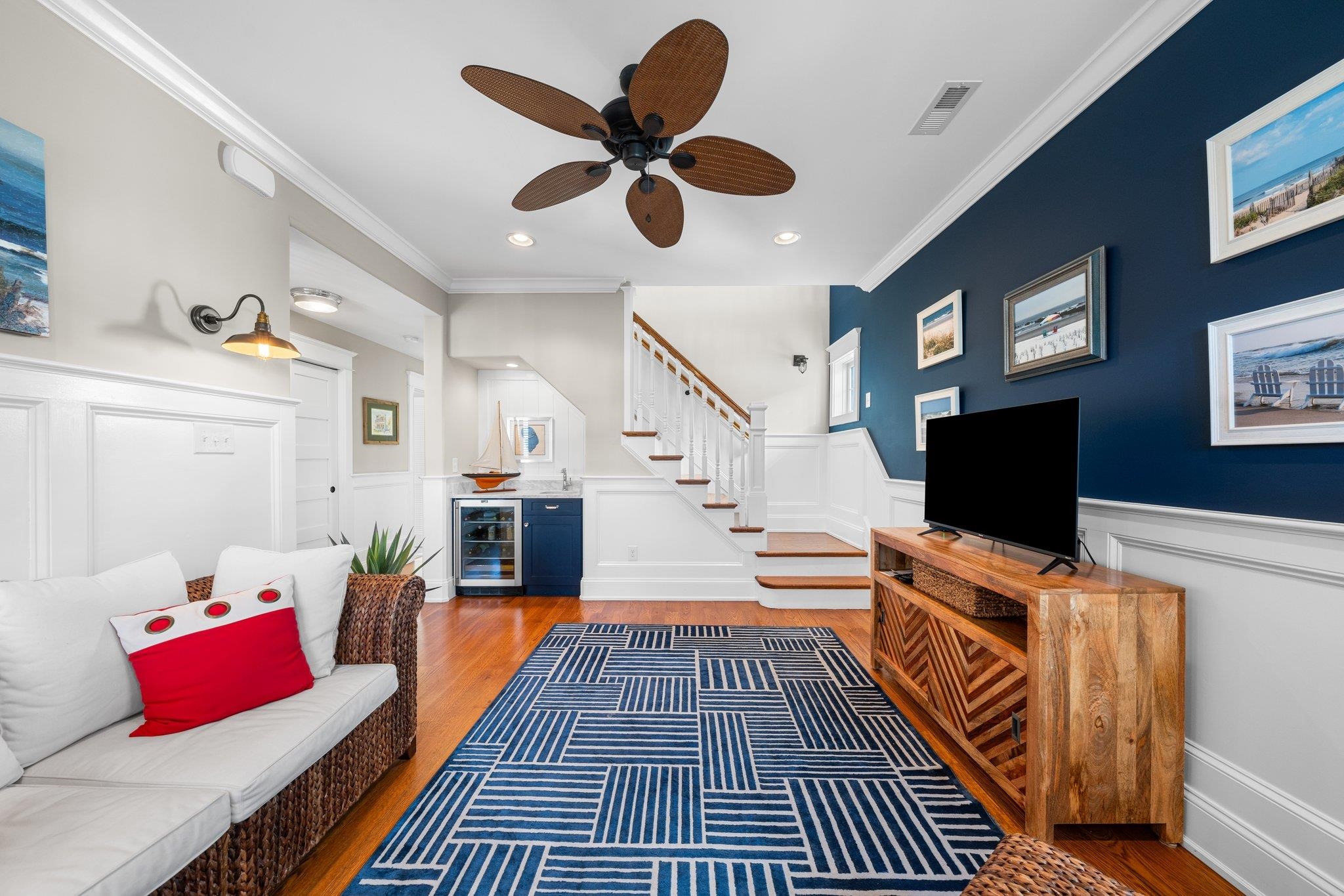243 110th Street Stone Harbor, NJ 08247 - Photo 14 of 34 a living room with furniture and a flat screen tv
