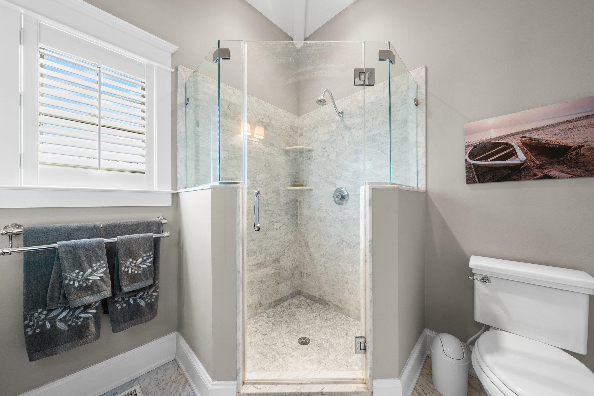 243 110th Street Stone Harbor, NJ 08247 - Photo 20 of 34 a bathroom with a shower a toilet and a sink