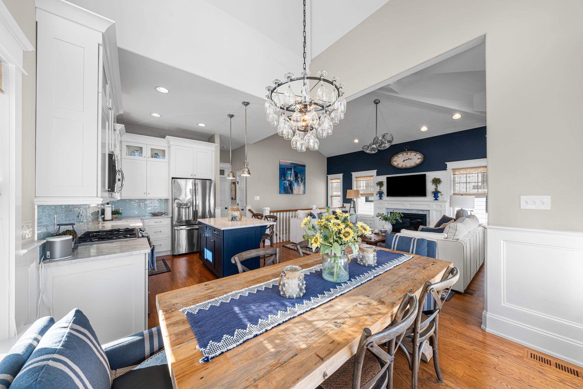 243 110th Street Stone Harbor, NJ 08247 - Photo 27 of 34 a living room with fireplace furniture and a flat screen tv