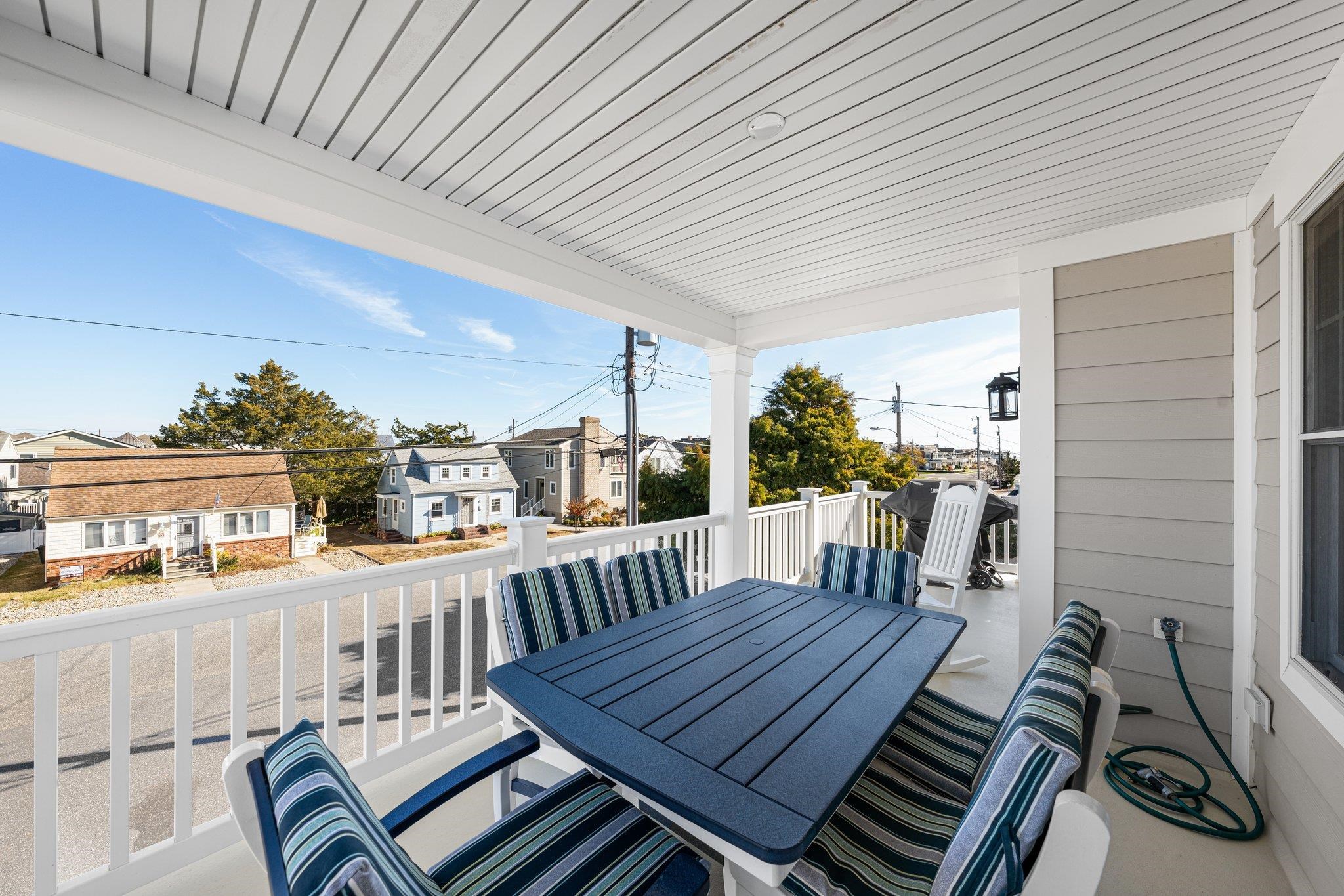 243 110th Street Stone Harbor, NJ 08247 - Photo 29 of 34 a view of a chairs and tables in patio