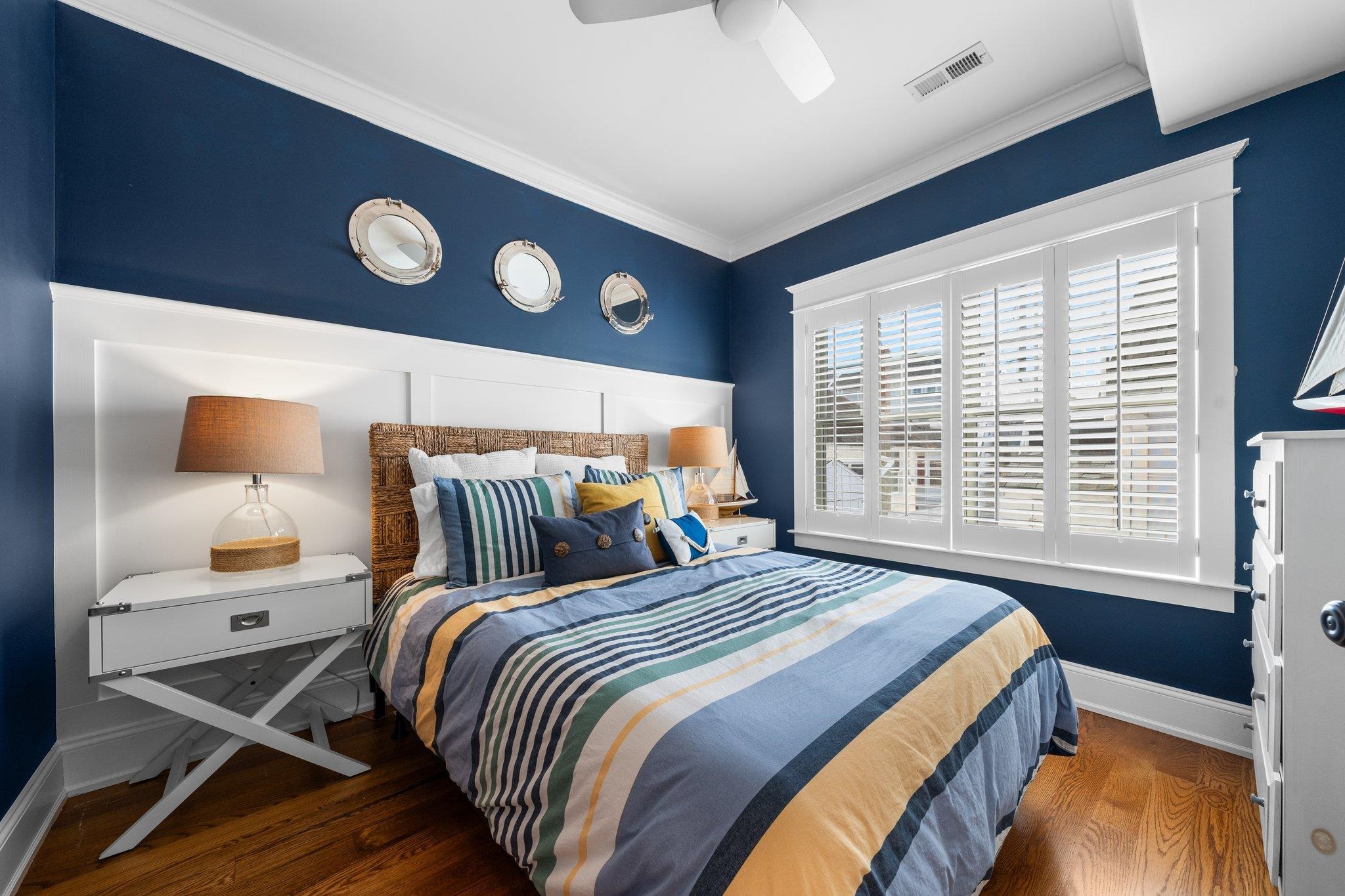 243 110th Street Stone Harbor, NJ 08247 - Photo 8 of 34 a bed sitting in a bedroom next to a window