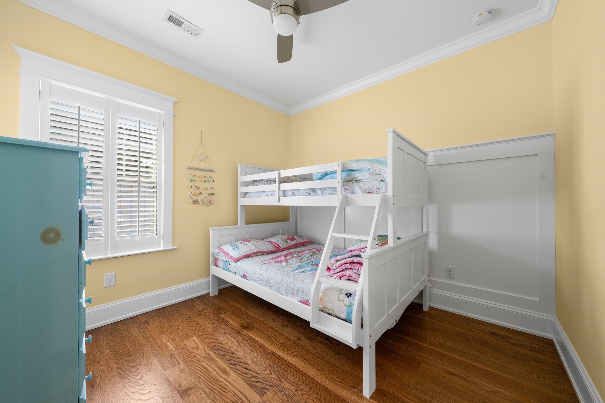243 110th Street Stone Harbor, NJ 08247 - Photo 10 of 34 a bedroom with a bed and a window