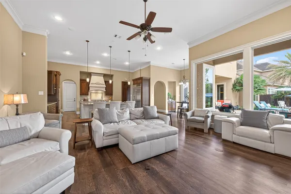 a kitchen with granite countertop a sink and cabinets